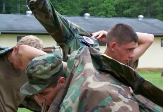 Here I am rushing with others to get my uniform back on after sports.