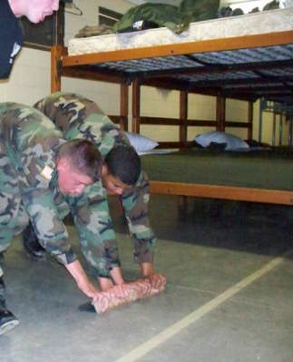 The BUG 500: pushing ALL the bunks in the center of the barracks, and doing laps around the room, be it sweeping or crouch-walks.